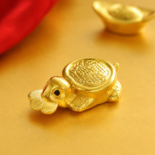 Gold-tone Money-Biting Turtle Feng Shui figurine with coin detail