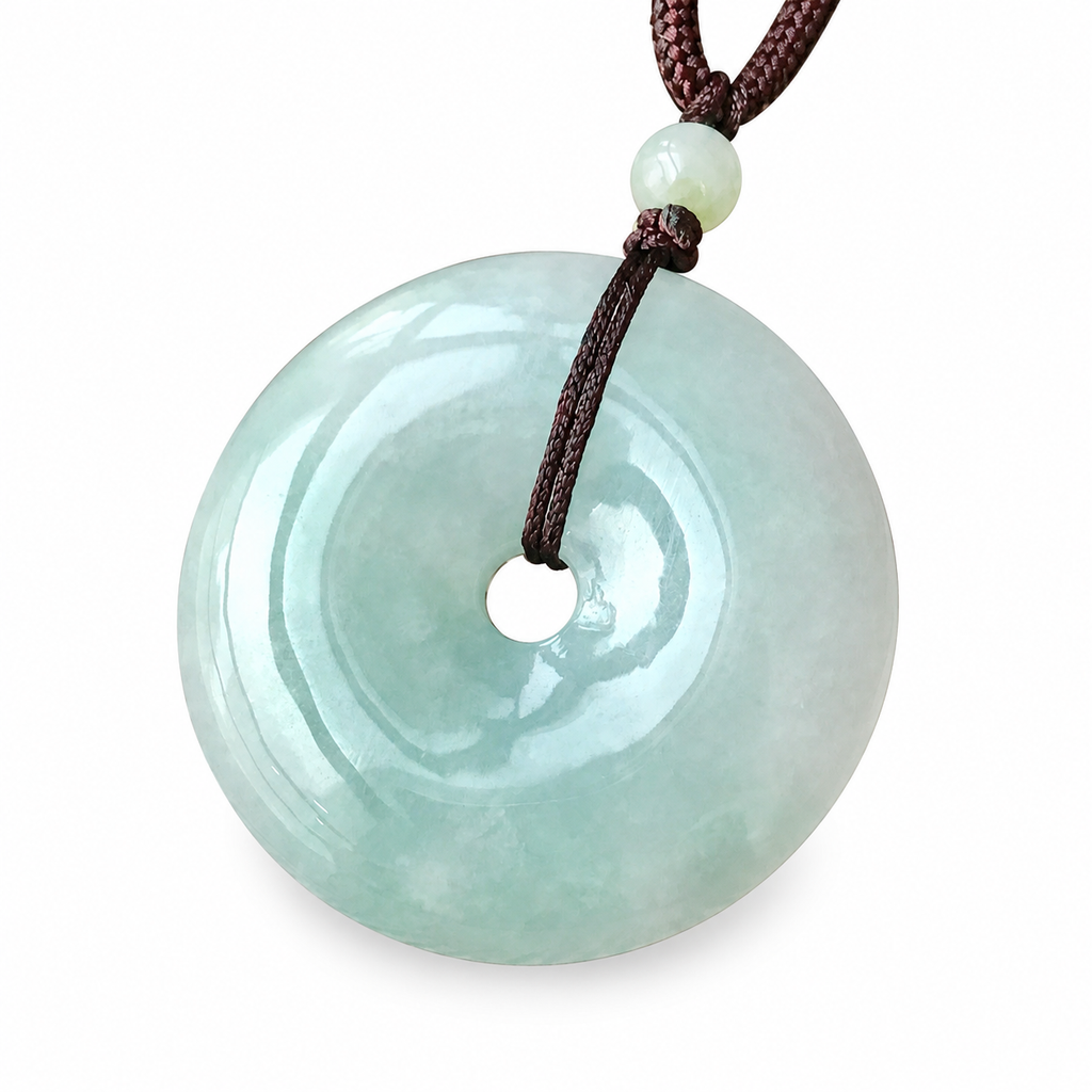 Pale Green Donut Pendant Necklace — angled view