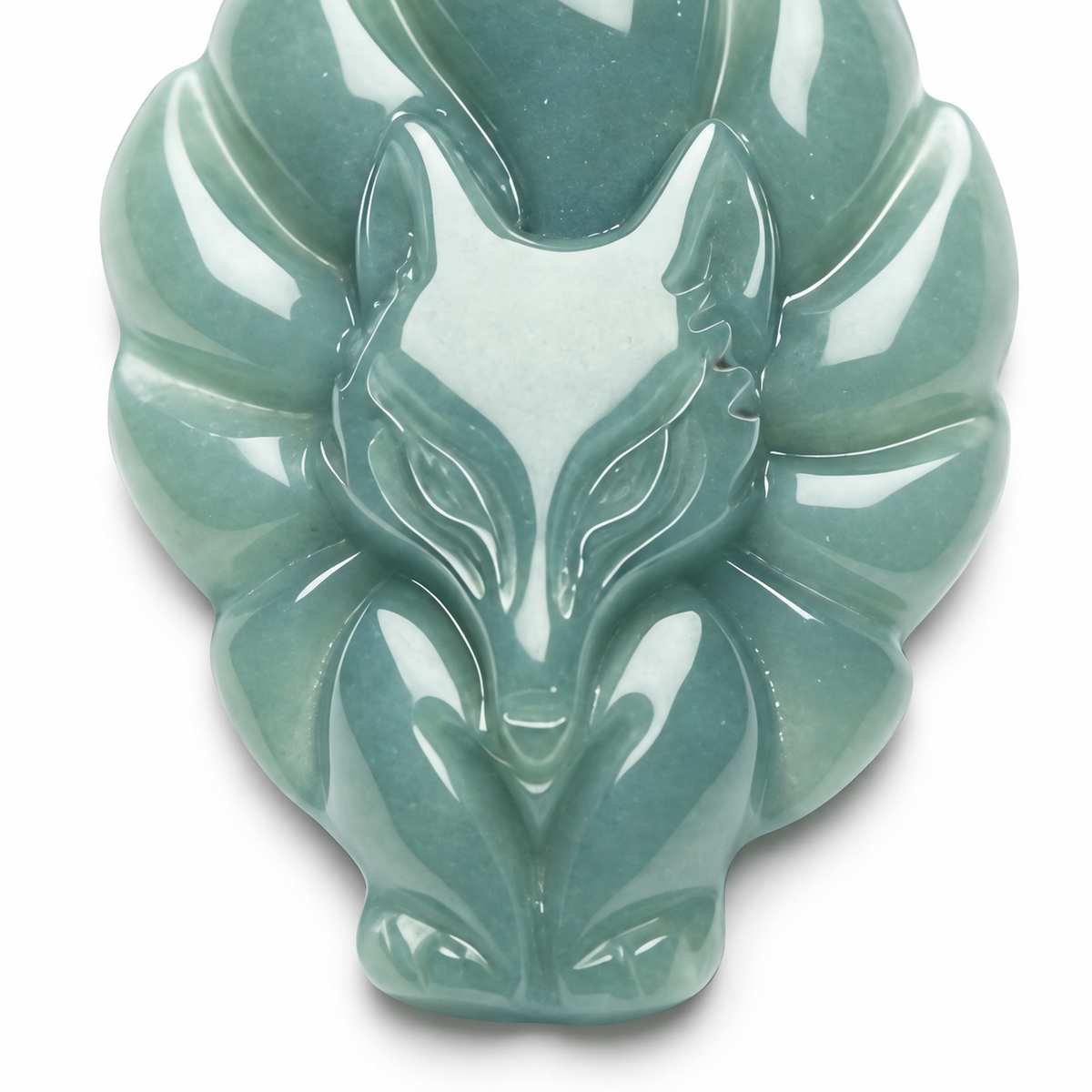 Carved Pale Green Fox Pendant — detail view