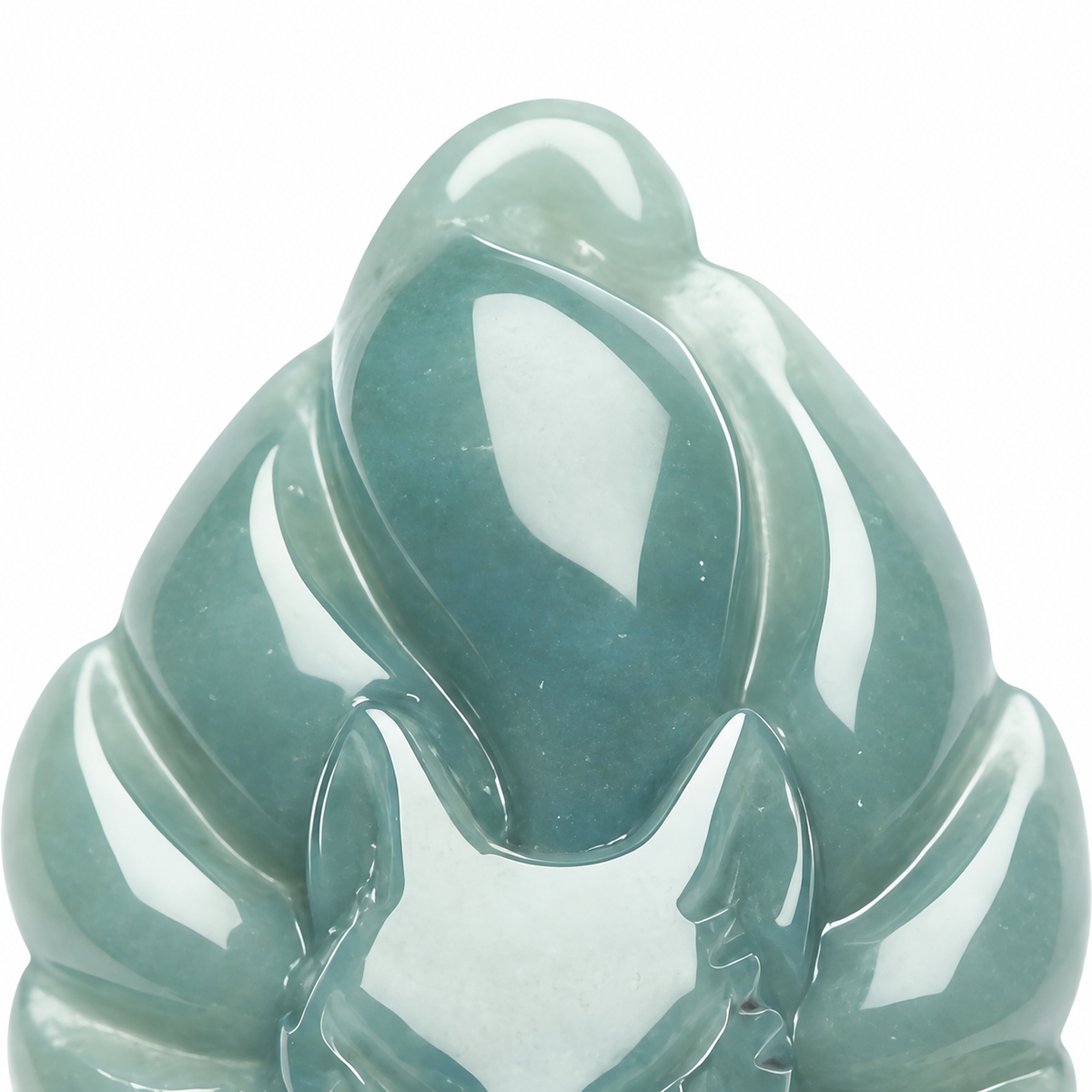 Carved Pale Green Fox Pendant — close-up detail