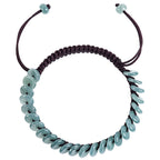 Blue Green Disc Bead Cord Bracelet - angled view on white