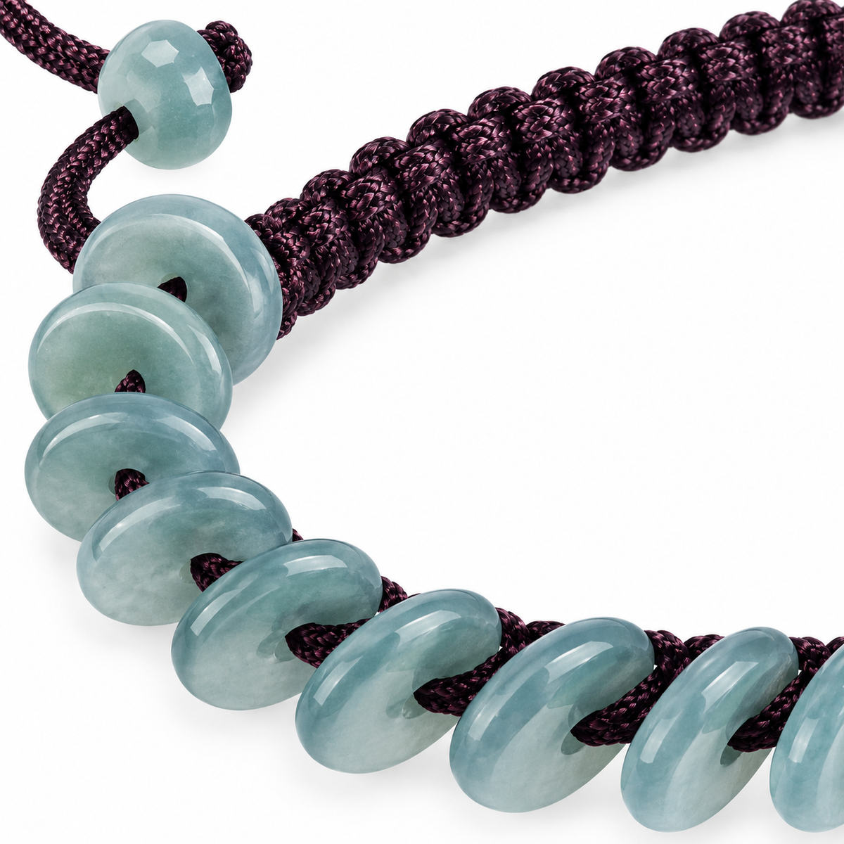 Blue Green Disc Bead Cord Bracelet - centerpiece detail on white