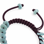 Blue Green Disc Bead Cord Bracelet - cord and bead detail on white