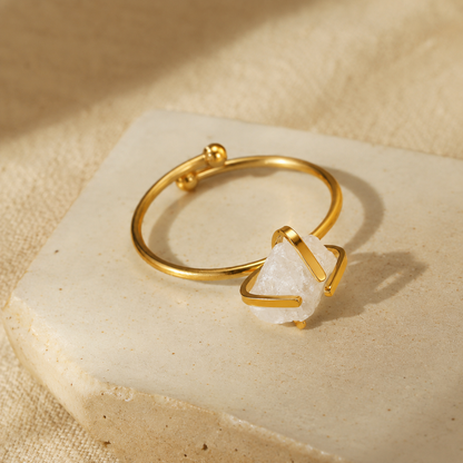 Gold-plated stainless steel ring with an irregular clear raw-style stone and chain-link band