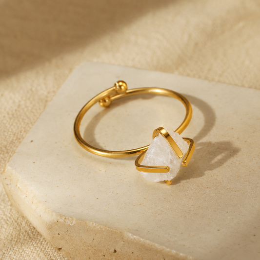 Gold-plated stainless steel ring with an irregular clear raw-style stone and chain-link band