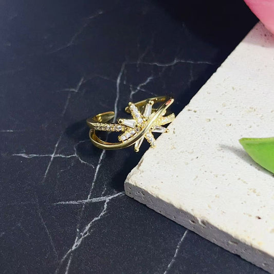 Gold-plated 925 sterling silver starburst adjustable ring with clear stone accents