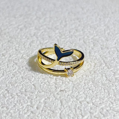 Gold-plated 925 sterling silver whale tail adjustable ring with blue and clear accents