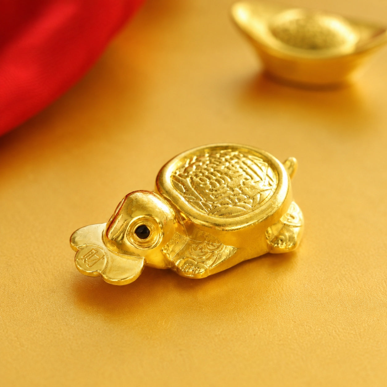 Gold-tone Money-Biting Turtle Feng Shui figurine with coin detail