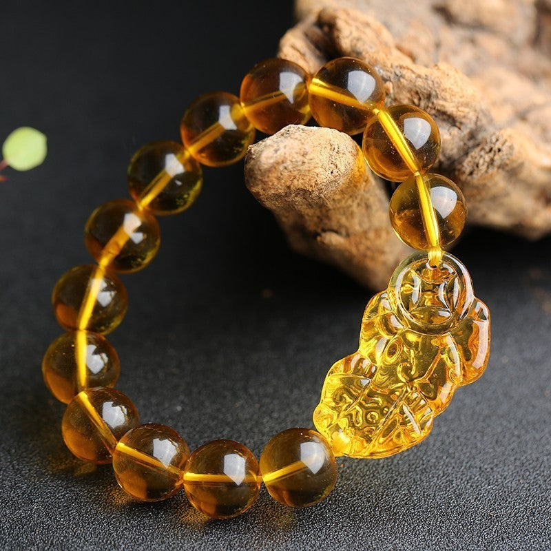 Citrine Pixiu bracelet with golden beads and carved charm