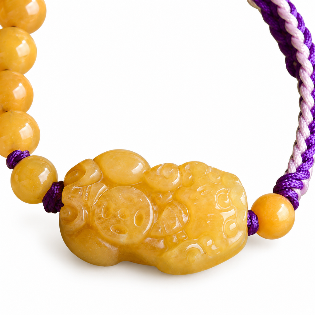 Golden Yellow Pixiu Cord Bracelet - centerpiece detail on white
