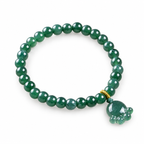 Green Paw Charm Bead Bracelet - angled view on white