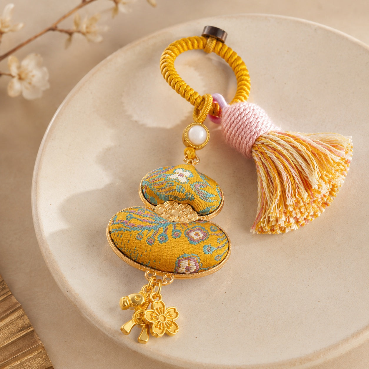 Mustard gold brocade lucky gourd hanging charm with cotton tassel and decorative charms