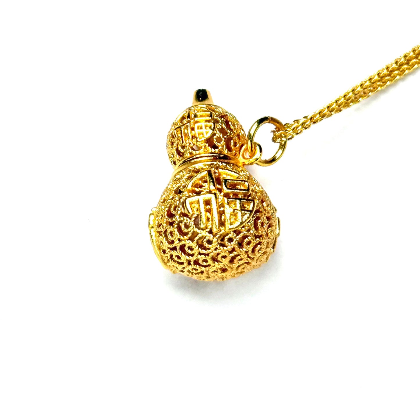 A crisp front view of an authentic sand gold Hulu gourd pendant showcasing fine imperial filigree openwork with detailed crimson and blue enamel accents on a white background.