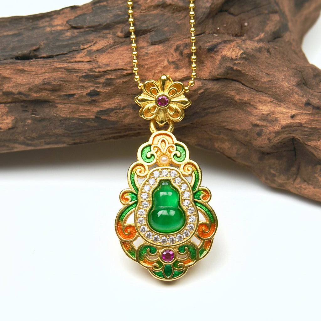 Macro close-up shot of a luxurious gold enamel Hulu charm on wood, capturing the beautiful translucent quality of the central green gemstone under natural light.