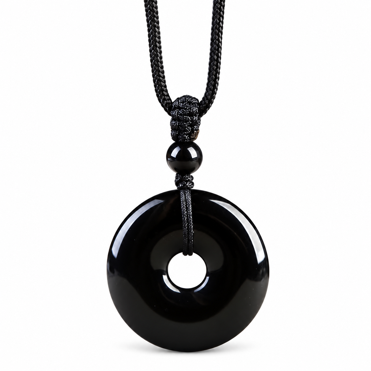 Black Donut Pendant Cord Necklace — angled view