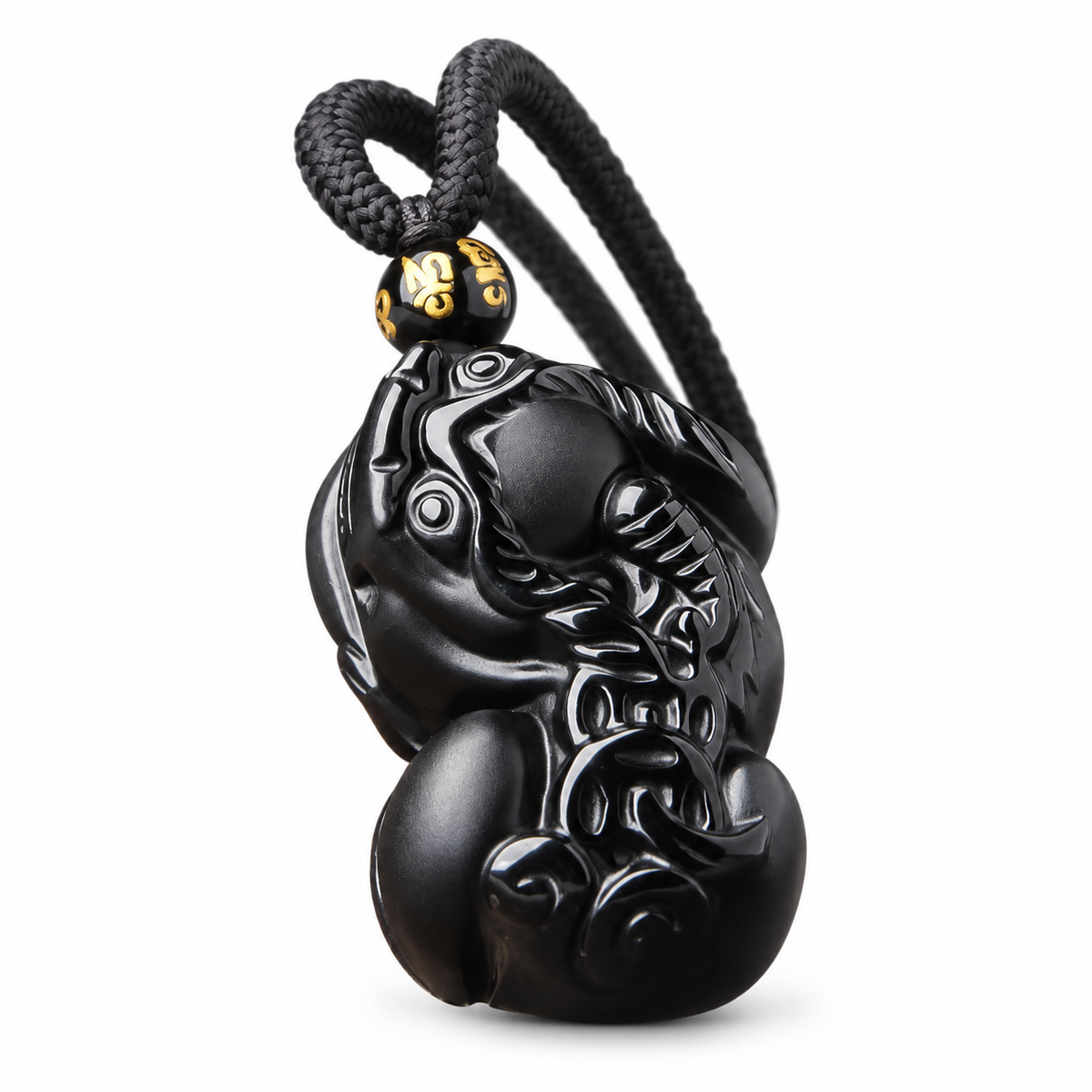 Black Carved Pixiu Pendant — angled view
