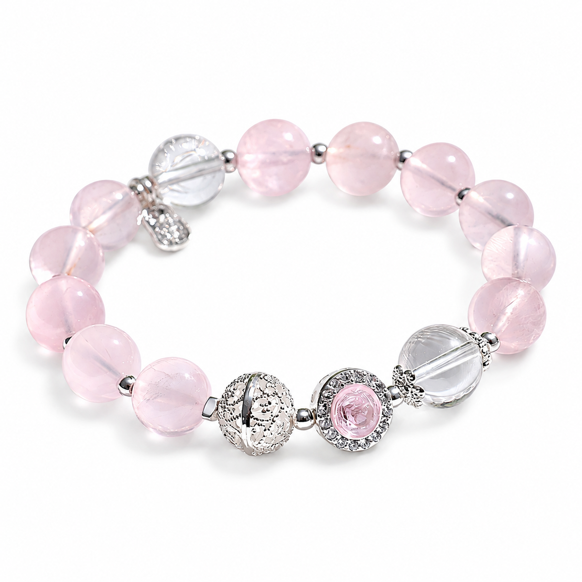Rose Quartz Bracelet — round pink accent, angled view