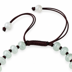 Pale Lotus Rondelle Bead Bracelet - cord and bead detail on white