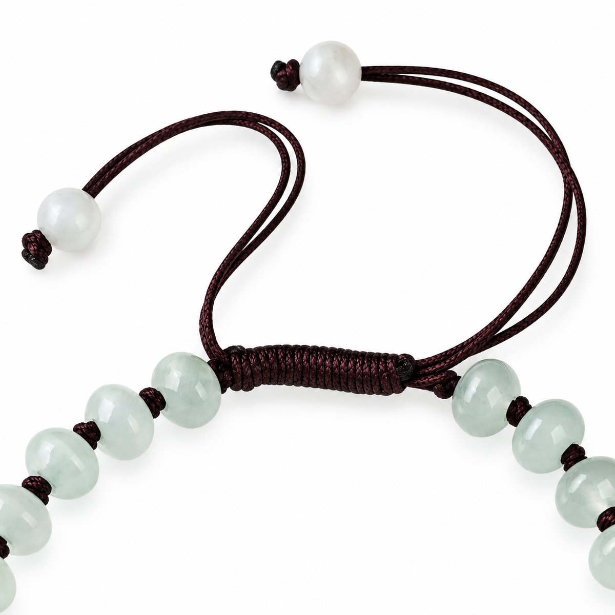 Pale Lotus Rondelle Bead Bracelet - cord and bead detail on white