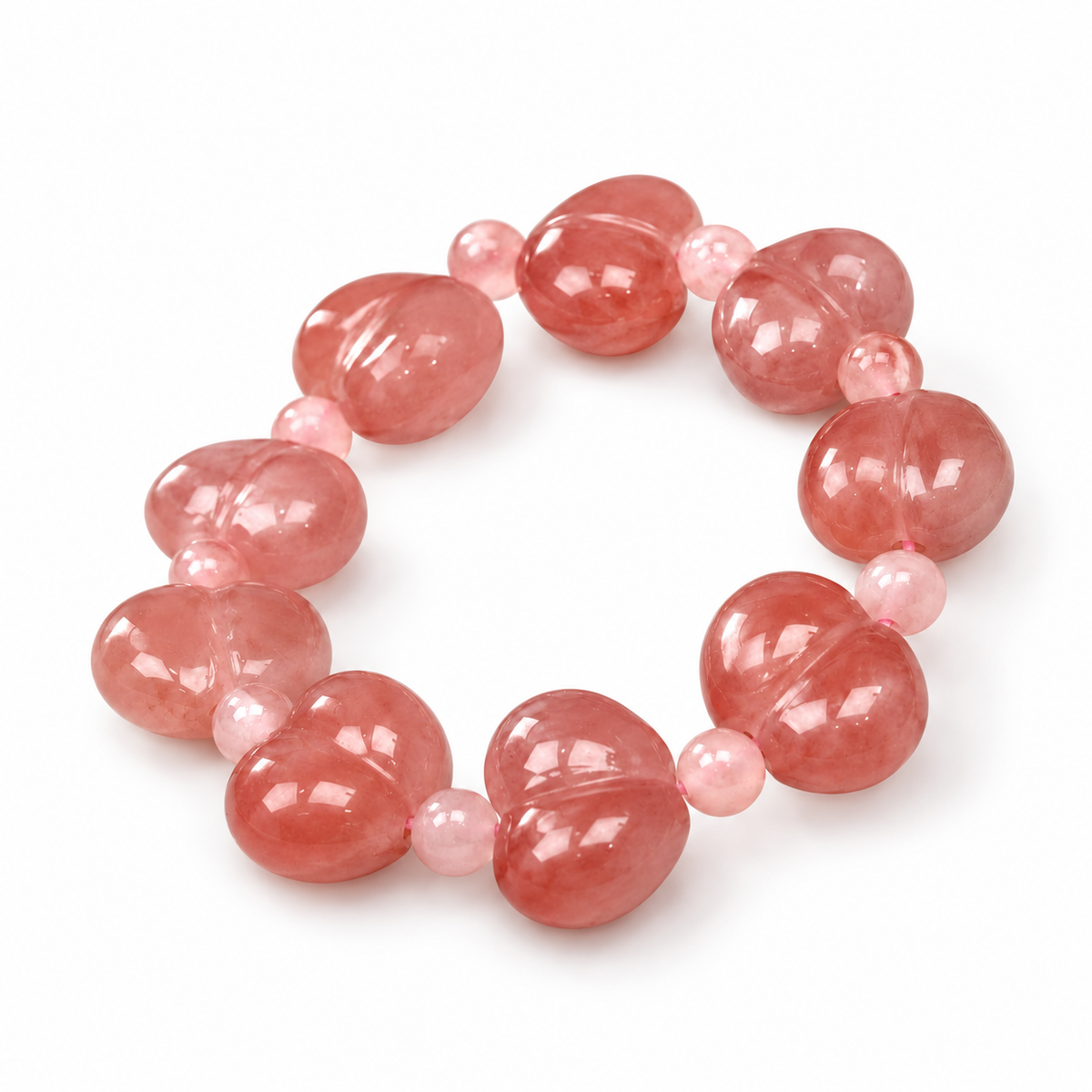 Peach Blossom Quartzite Jade Heart Bead Bracelet — low-angle view