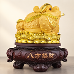 Golden money frog ornament — side view