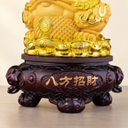 Golden money frog ornament — coin and base detail