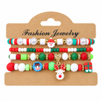 Festive Character Mix — Christmas charm bracelet four-piece set, overhead view on white