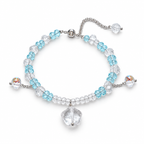 Ice Veil Blue and Clear Beaded Charm Bracelet — angled view on white
