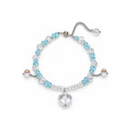 Ice Veil Blue and Clear Beaded Charm Bracelet — overhead view on white