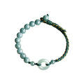 Blue Bead and Ring Cord Bracelet — overhead view