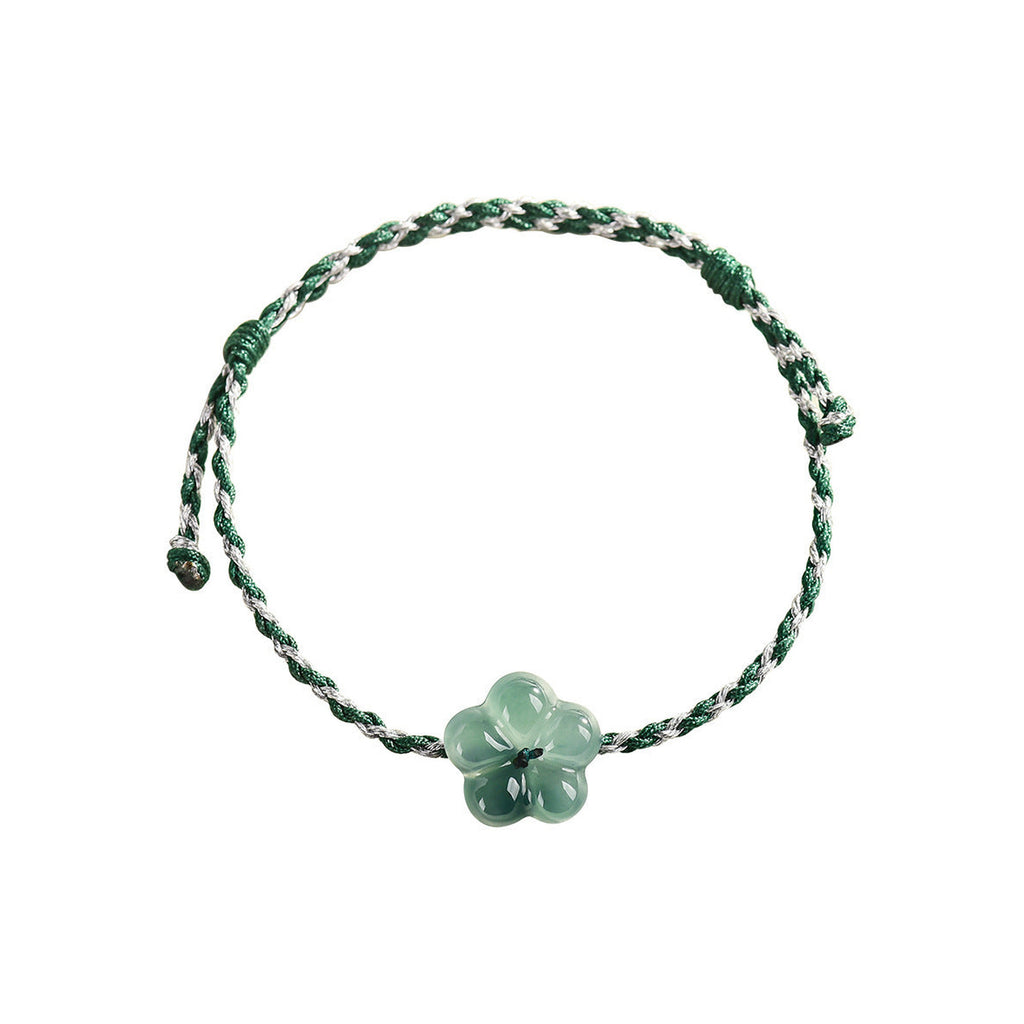 Blue Green Blossom Cord Bracelet - overhead view on white