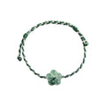 Blue Green Blossom Cord Bracelet - overhead view on white