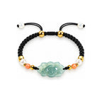 Blue Green Lotus Braided Bracelet - overhead view on white
