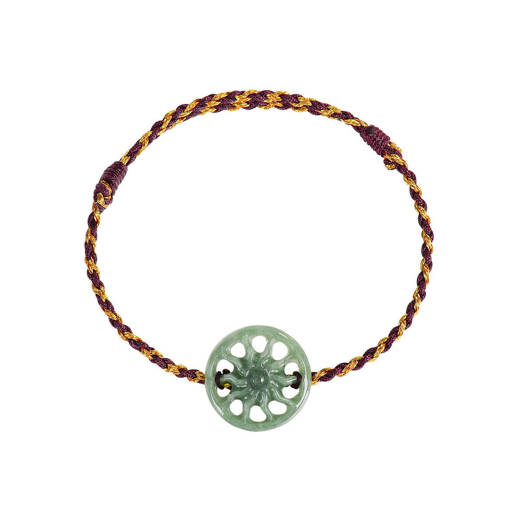 Green Sun Disc Cord Bracelet - overhead view on white