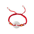 Pale Ring Red Cord Bracelet - overhead view on white