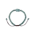 Blue Green Pixiu Rondelle Bracelet - overhead view on white