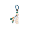 Pale bean pod and flower bag charm — hero