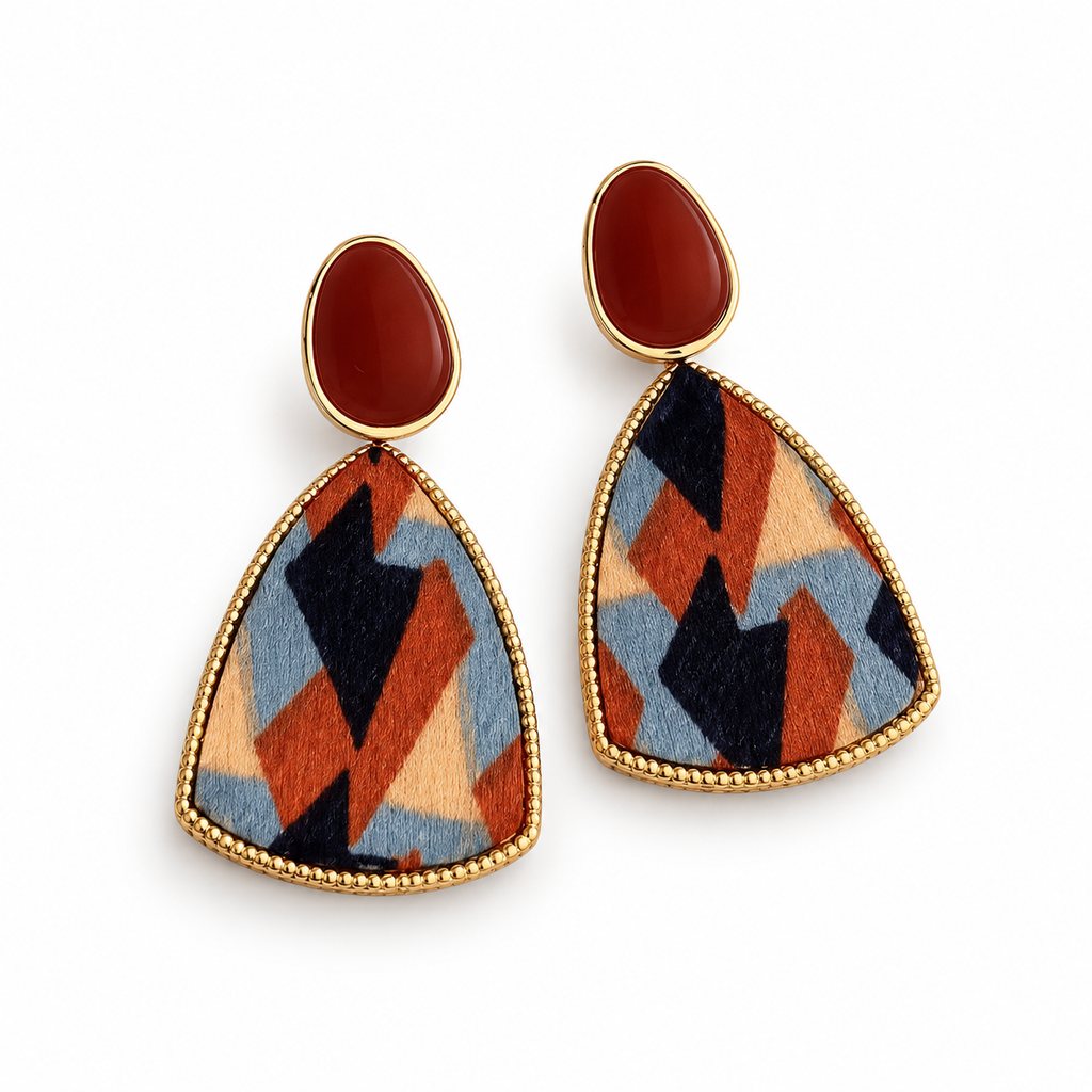 Burgundy Geometric Pattern Drop Earrings — angled pair on white