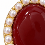 Burgundy Oval Halo Stud Earrings — front surface detail