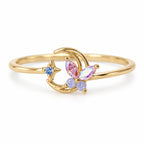 Crescent butterfly gold-tone adjustable ring with pink and blue accents — detail view