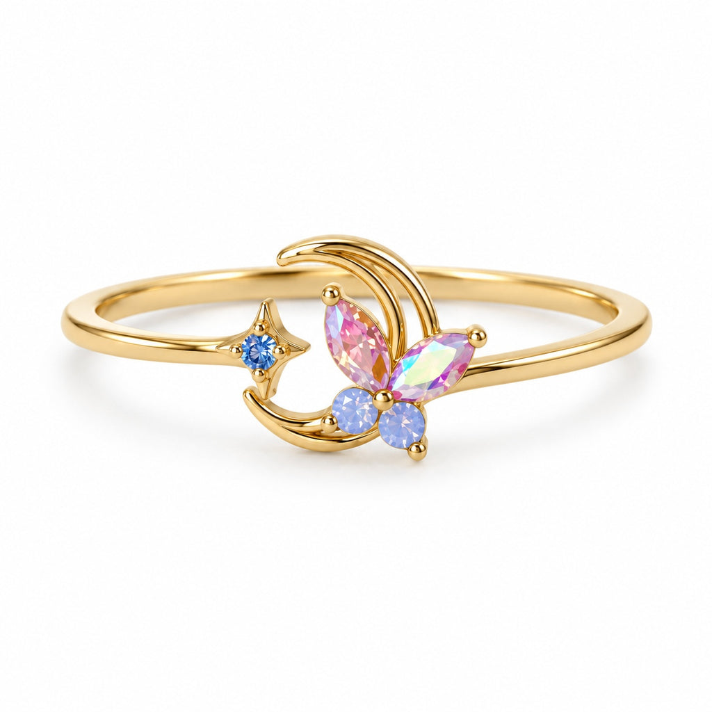 Crescent butterfly gold-tone adjustable ring with pink and blue accents — elevated view