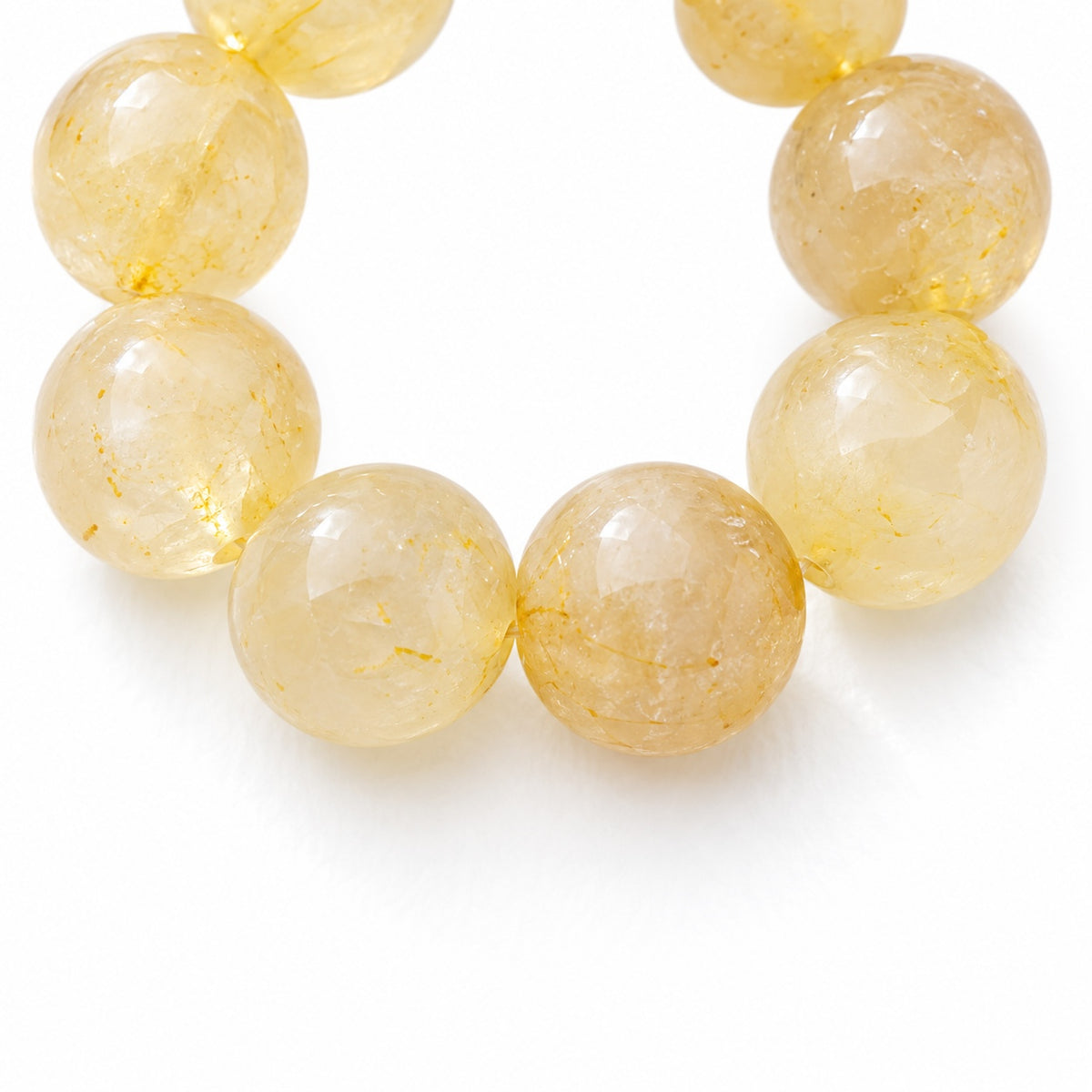Golden bead loop phone charm — bead detail
