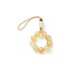 Golden bead loop phone charm — hero