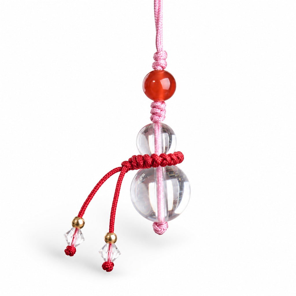 Clear gourd bead and tassel detail