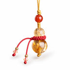 Golden yellow gourd bead and tassel detail