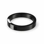 Polished black flat band ring — angle