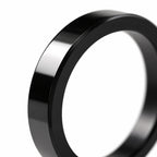 Polished black flat band ring — edge detail