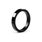 Polished black flat band ring — hero