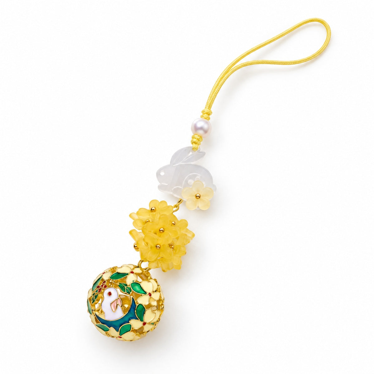 Rabbit and yellow flower bell charm — angle