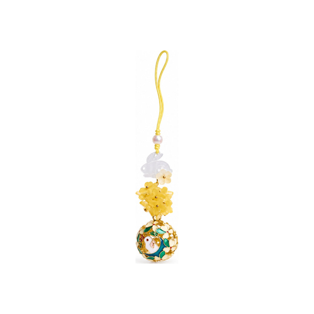 Rabbit and yellow flower bell charm — hero
